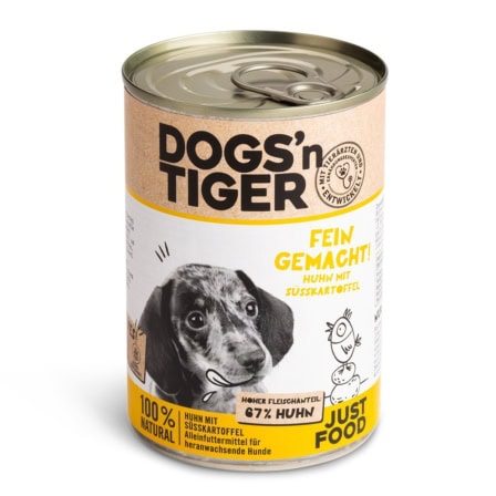 Hondenvoer in blik met hondenafbeelding en label 'Dogs'n Tiger'.