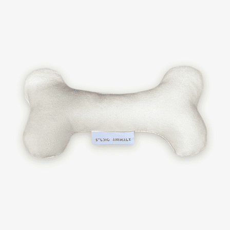 Hondenbotje van zacht wit textiel voor huisdieren.